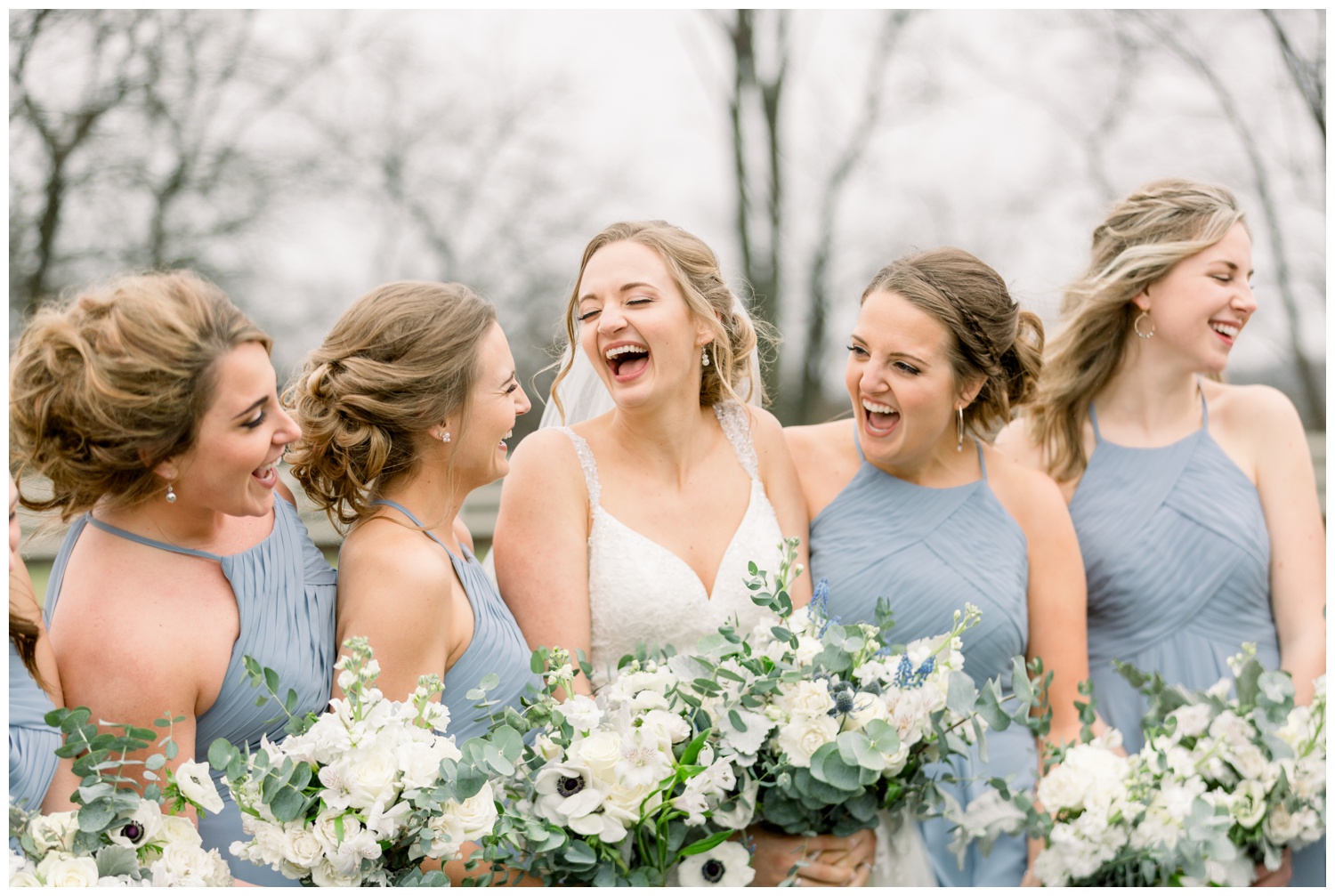 Bride Laughing with Bridesmaids