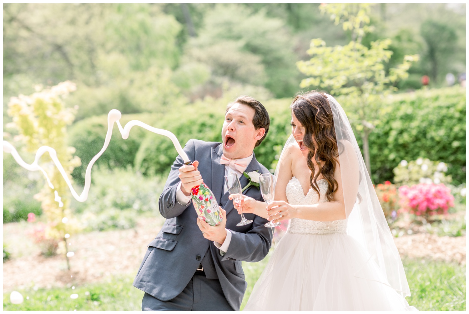 Bride and Groom Popping Champagne at Ault Park - Cincinnati Wedding Photographer