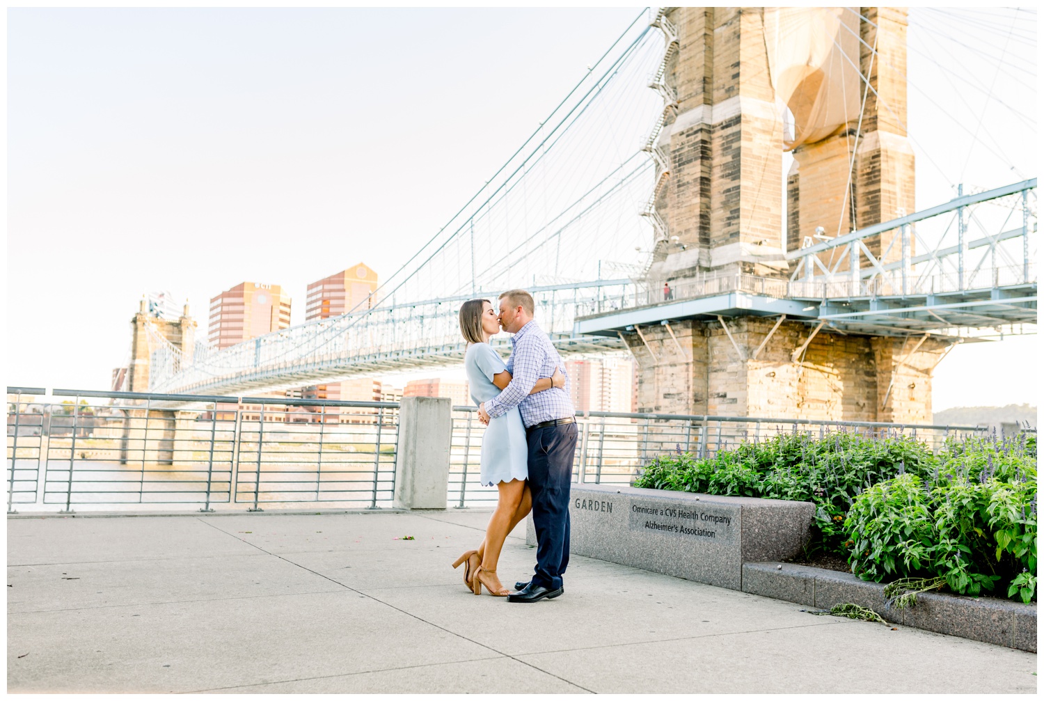 Couple Kissing at Roebling Bridge in Smale Park - Cincinnati Wedding Photographer