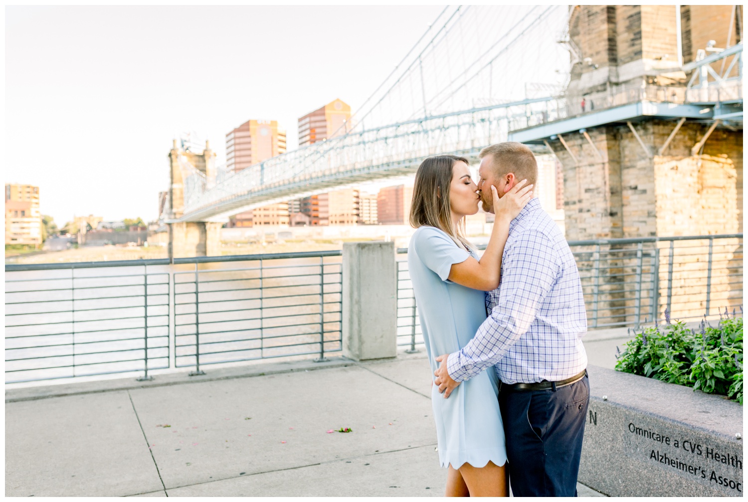 Couple Kissing in front of Roebling Bridge at Smale Park