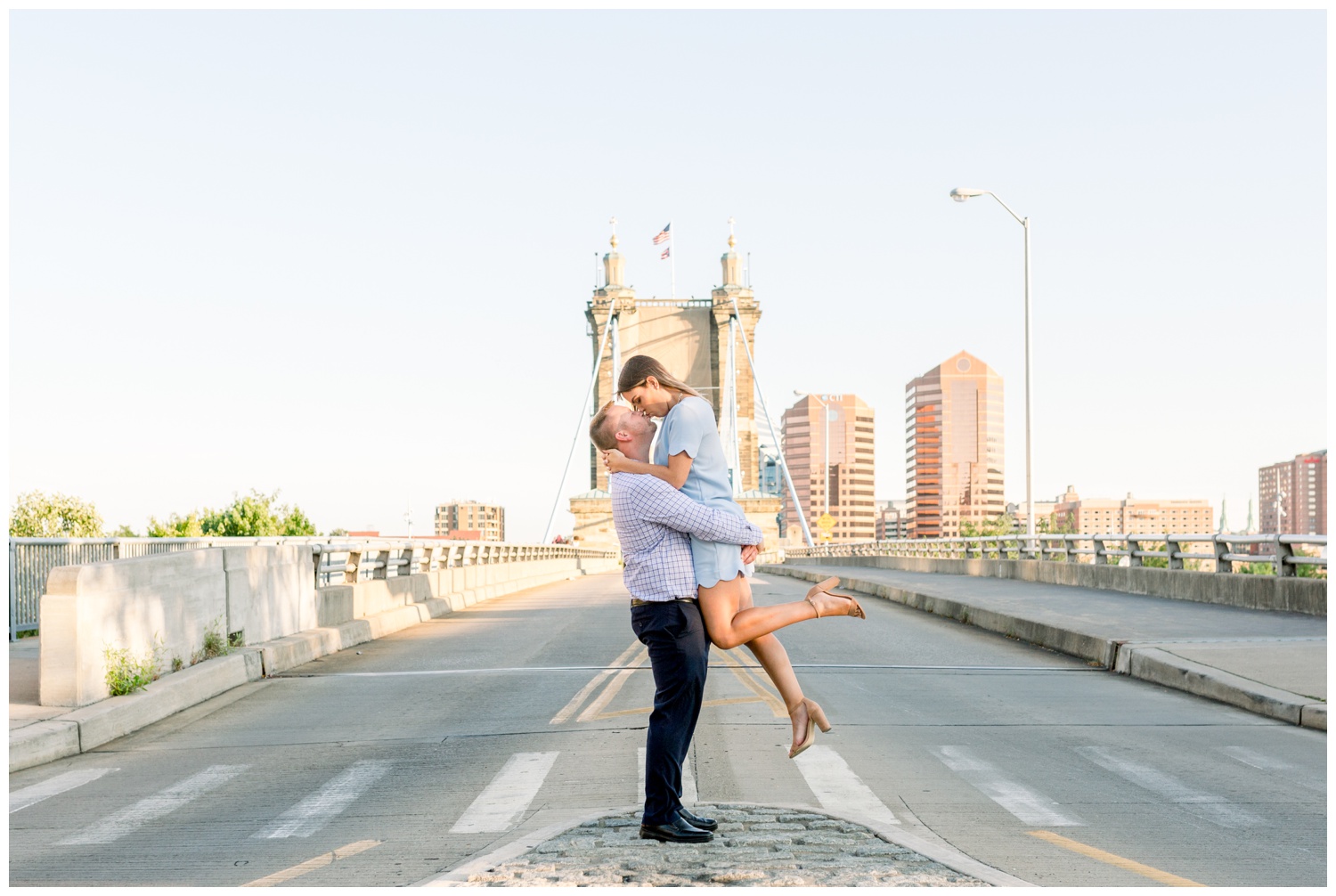 Smale Park Engagement Pictures in front of Roebling Bridge