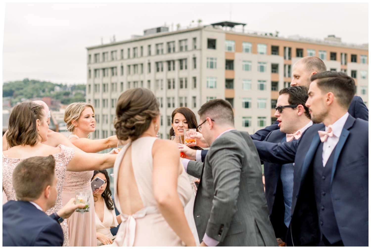 Bridal Party Toasting at The Lytle Park Hotel Rooftop Bar