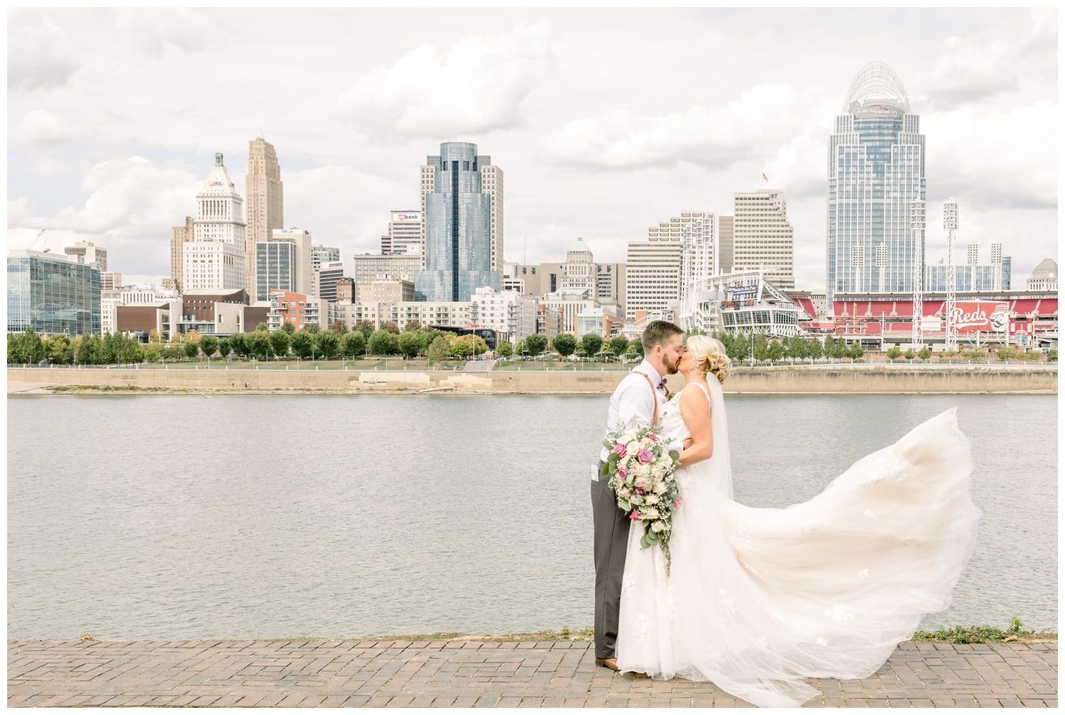 Bride and Groom with Cincinnati Skyline at George Rogers Clark Park Covington