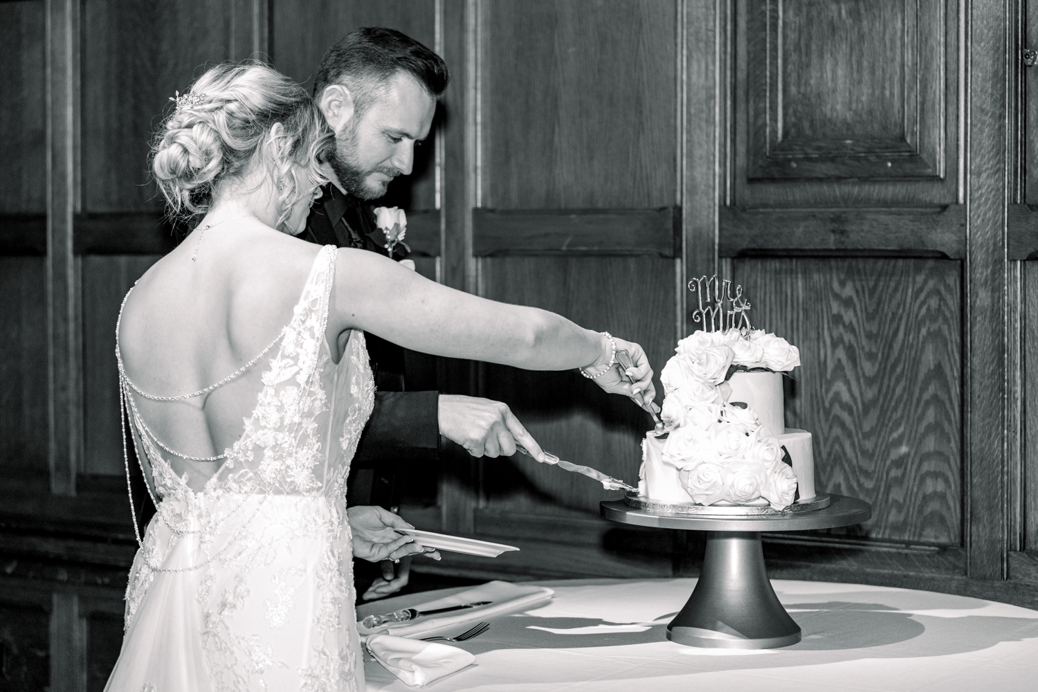 Bride and Groom Cutting Cake at The Cincinnati Club Wedding Reception