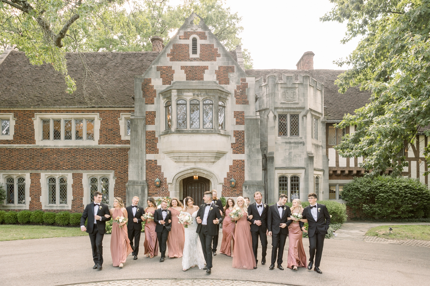 Bridal Party Walking in Front of Pinecroft at Crosley Estate in Cincinnati
